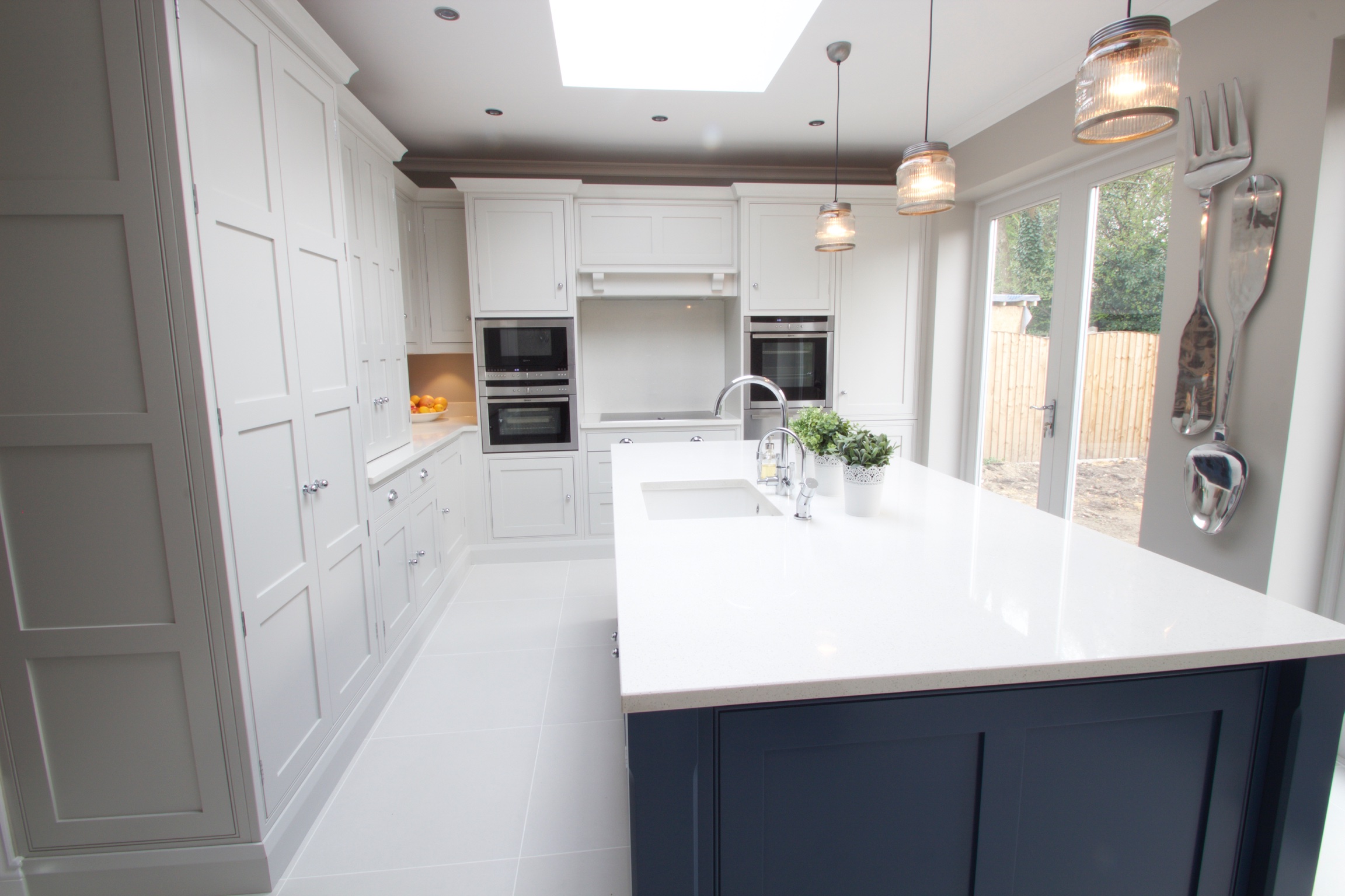 panelled shaker kitchen with larder
