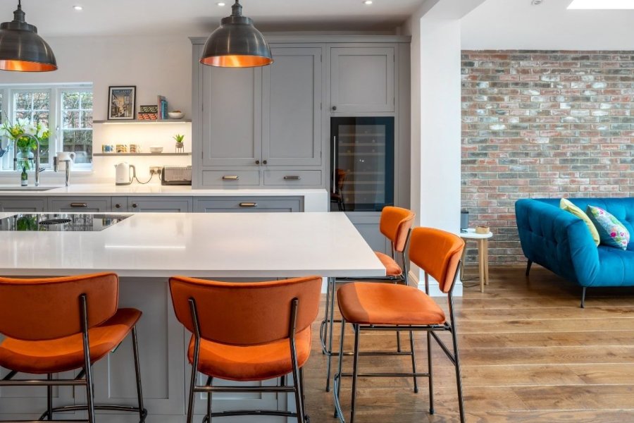 Light Grey Painted Shaker Kitchen with Burnt Orange Stools