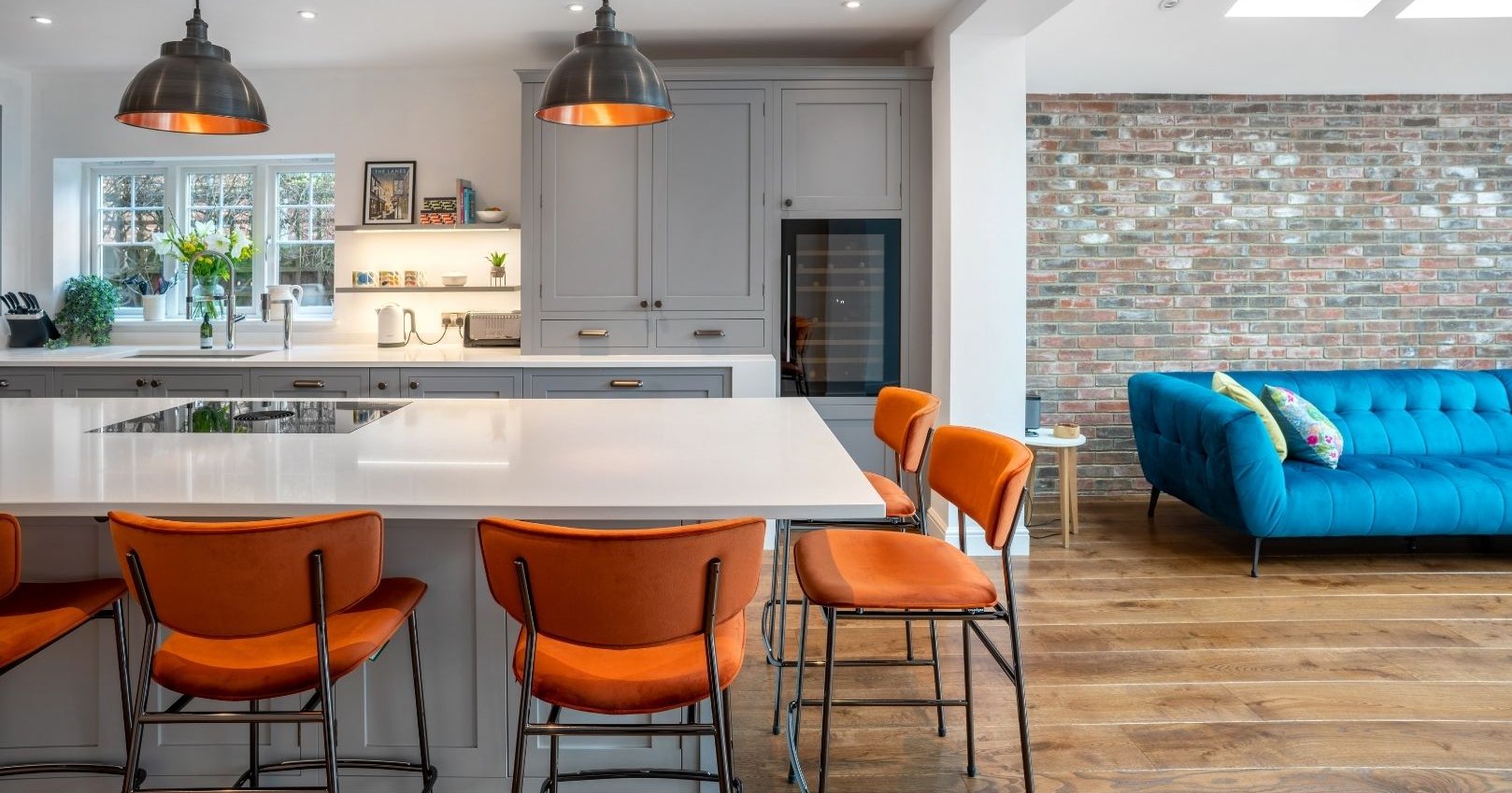 Light Grey Painted Shaker Kitchen with Burnt Orange Stools